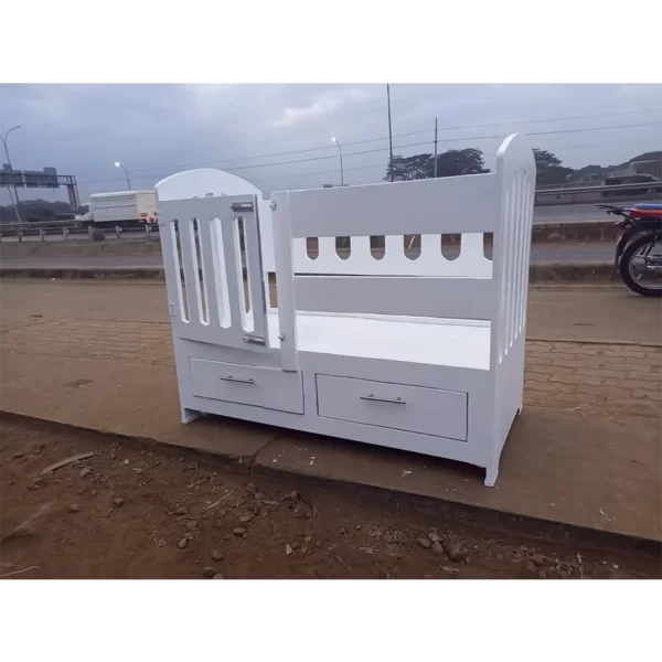white kid bed with two drawers