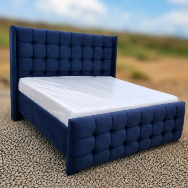6 by 6 dark blue chester bed with a mattress