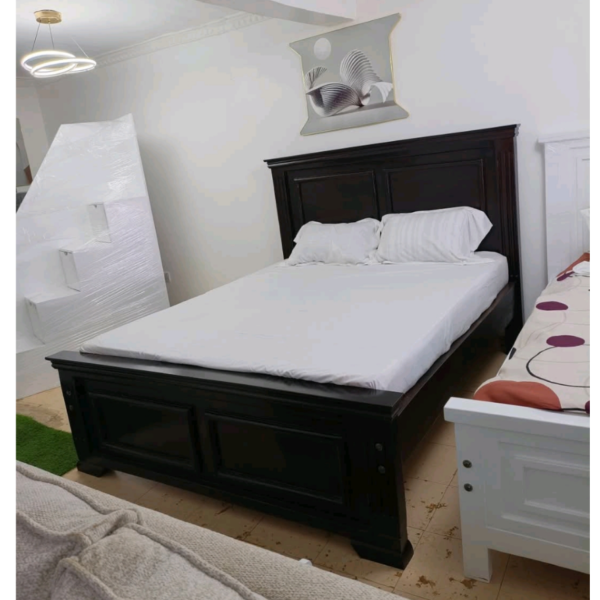 5 by 6 black wooden bed